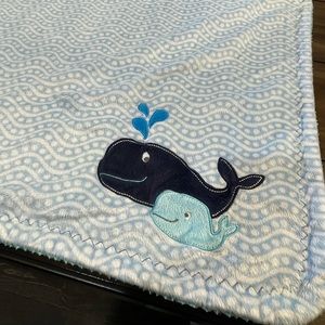 Baby blanket with whale design